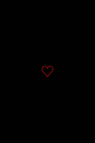 Glowing Heart in the Da..