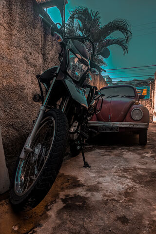 Urban Ride: A Tale of Two Wheels 🏍️🚗