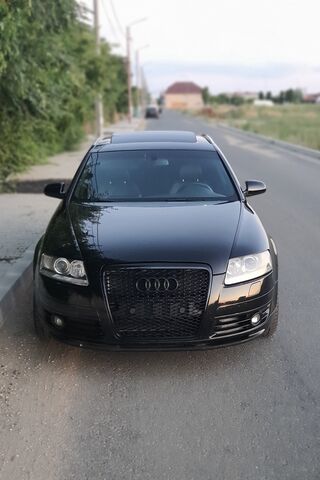 Sleek Black Audi on the Open Road 🚗✨