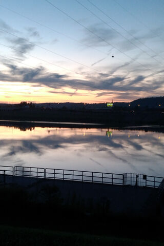 Serene Sunset Reflectio..