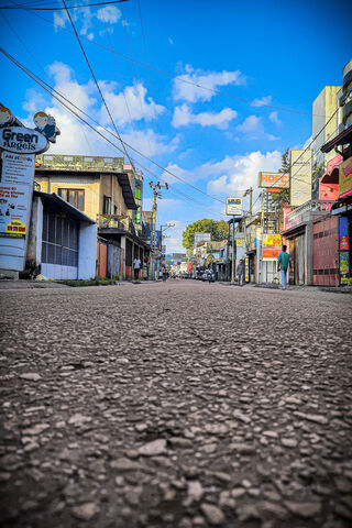 Serene Streets Under a Blue Sky 🌤️
