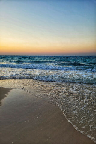 Serene Sunset at the Sh..