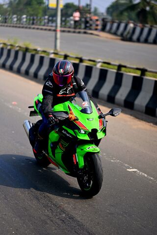 Thrilling Ride on a Green Machine! 🏍️💨