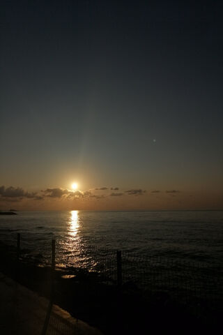 Serene Sunset Over the ..