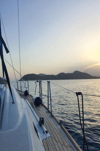 Serene Sunset Sailing 🌅⛵