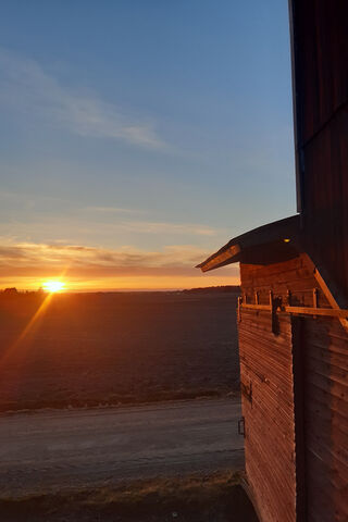 Serene Sunset Over Fiel..