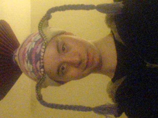 Me when younger with pink n dubz hat