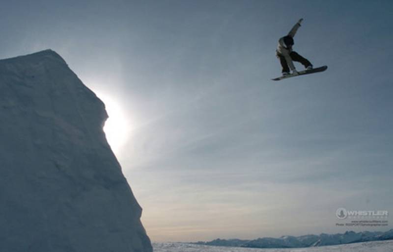 Snowboarder up in the air
