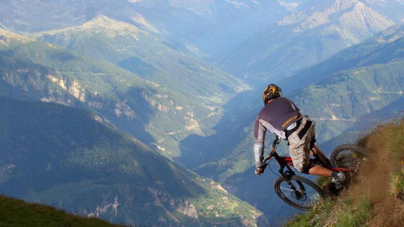 Riding on the edge of the mountain