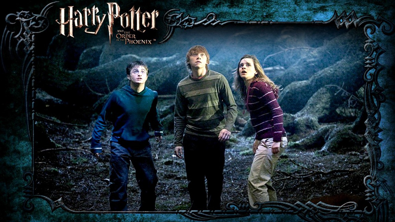 Harry,Ron and Hermione looking  at Grawp(Hagrids giant half brother)