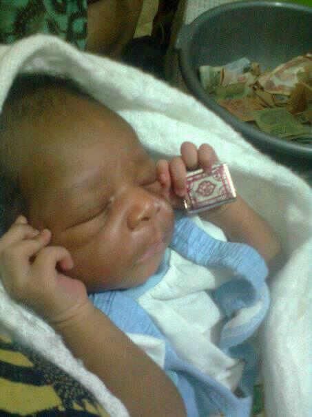 New baby born with Qur'an in his hand