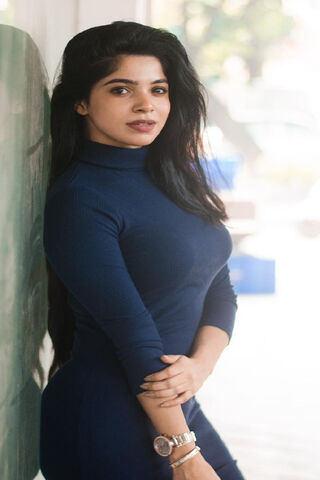 Elegance in Blue: The Charm of Divya Bharathi