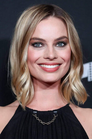 Radiant Charm: The Allure of Margot Robbie ✨