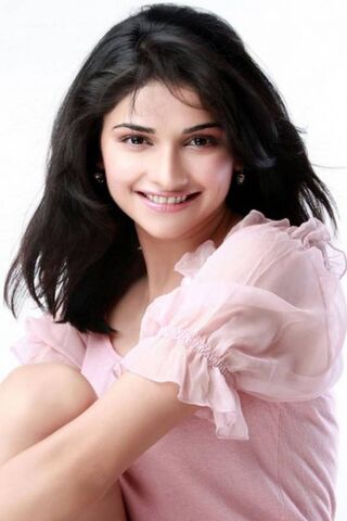 Radiant Charm: Prachi Desai's Sweet Smile 🌟