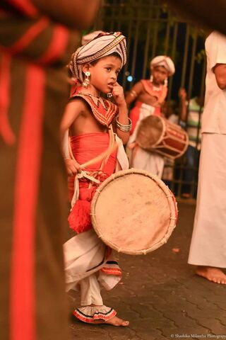 Rhythms of Innocence: The Young Drummer