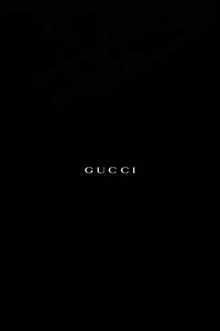 Download Gucci Supreme Logo On A Black Background Wallpaper