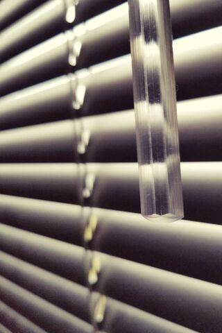 Whispers of the Past: A Glimpse Through Nostalgic Blinds