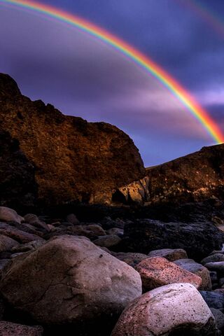 Rainbow On The Beach