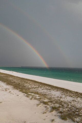 Rainbow At The Beach