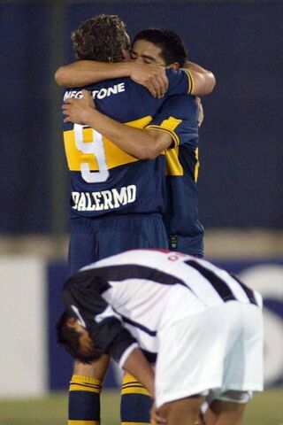 A Legendary Embrace: Riquelme and Palermo Unite