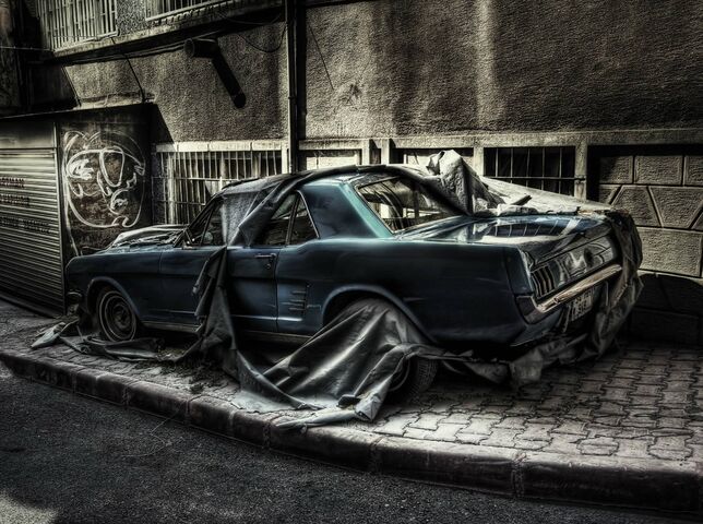 Classic mustang driving in a city with cyberpunk style - Images.AI Diffusion